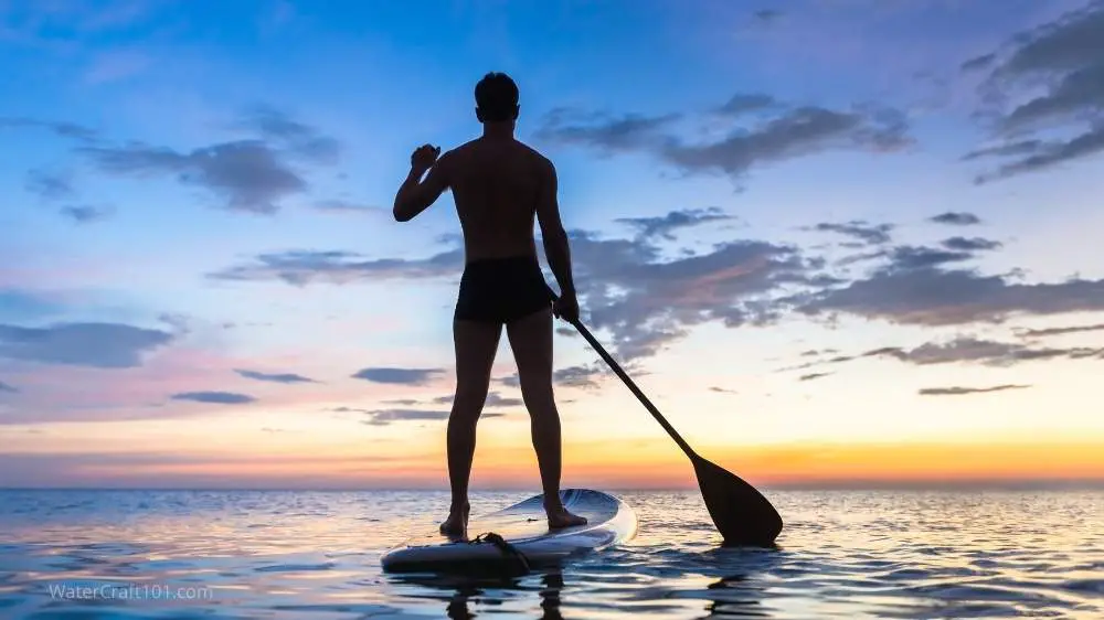 Man stand-up paddleboarding.