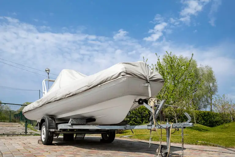 how do i keep my boat dry under a cover