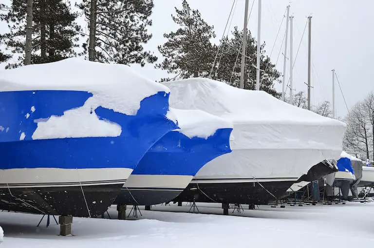 Keep a covered boat away from snow if you want to keep it dry