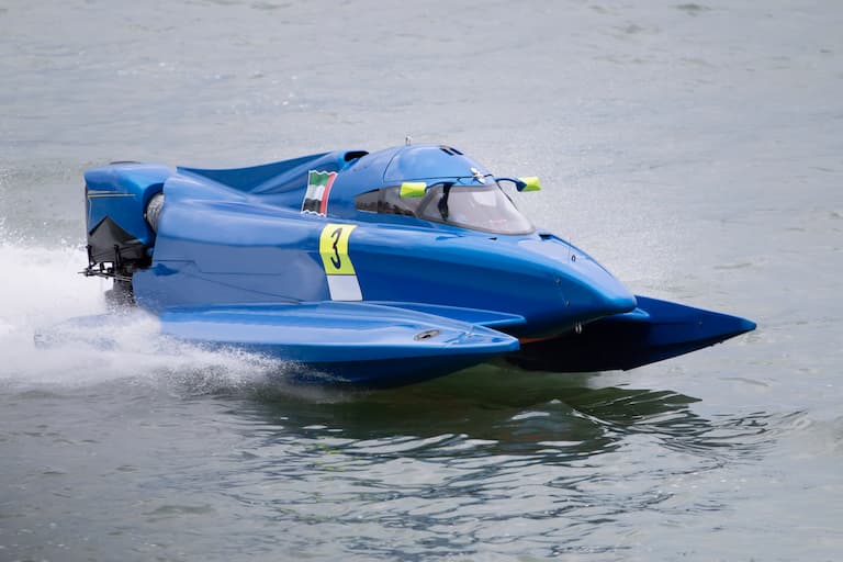 A high performance go-fast boat speeds across the water