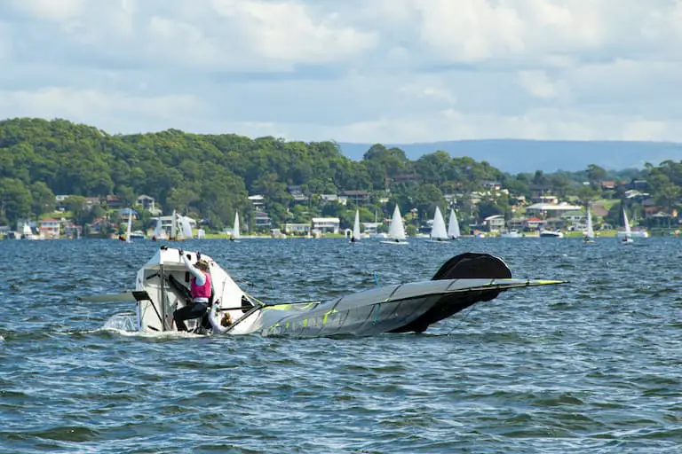 A sailboat that has heeled too far and capsized