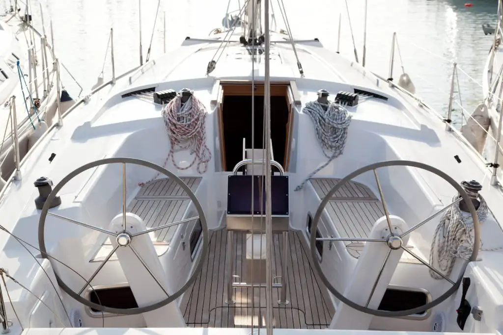 Sailboat with dual helms, one on the port and one on starboard side of the vessel