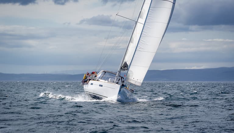 Sailboat heeling to its port side