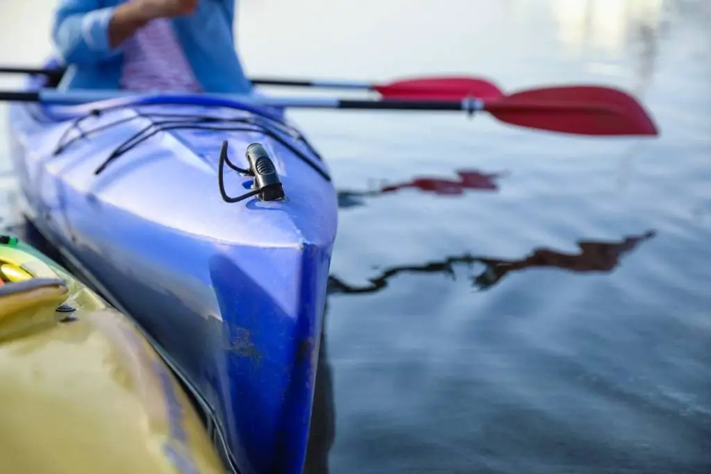 person sitting dry in a kayak